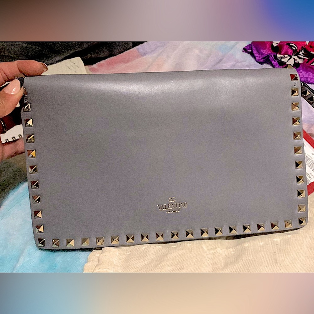 Valentino Clutch in pastel grey and deep red color with rockstar studs like new